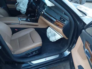 2015 BMW 7 Series 740Li xDrive with VIN WBAYF4C51FGS99074, listed as a IAAI auction lot 41222498 with 132,789 mi miles. Bid and sale history available at carsss.com. Image 5.