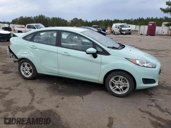 2017 Ford Fiesta SE with VIN 3FADP4BJ6HM134424, listed as a Copart auction lot 83703724 with Not Provided miles and Salvage Title. Bid and sale history available at DreamBid. Image 4.