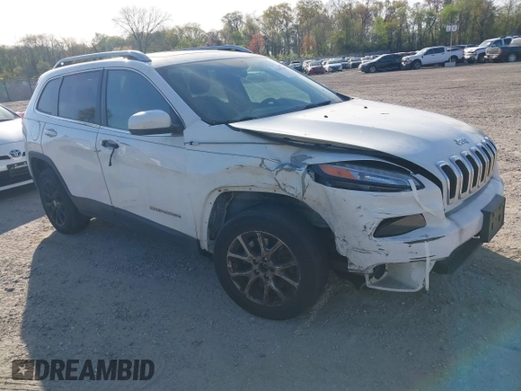 2015 Jeep Cherokee Latitude with VIN 1C4PJLCS6FW689607, listed as a IAAI auction lot 42103286 with 142,479 mi miles. Bid and sale history available at carsss.com. Image 1.