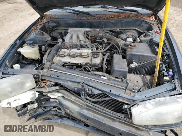 1994 Toyota Camry LE z VIN JT2GK12E2R0039606, wystawiony jako Copart lot #49840015 z przebiegiem 197 834 mil mil oraz Szkoda całkowita • Salvage title. Historia ofert i sprzedaży dostępna na DreamBid. Obrazek 11.