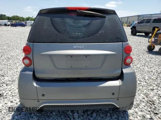2015 Smart fortwo Passion z VIN WMEEJ3BA5FK819174, wystawiony jako Copart lot #53205005 z przebiegiem 78 364 mil mil oraz Szkody całkowita. Historia ofert i sprzedaży dostępna na DreamBid. Obrazek 6.