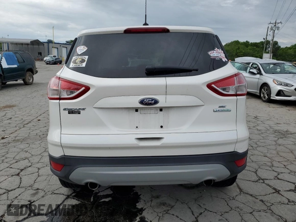 2013 Ford Escape SE with VIN 1FMCU0G90DUC26510, listed as a Copart auction lot 54227845 with 67,744 mi miles and Salvage Title. Bid and sale history available at DreamBid. Image 6.