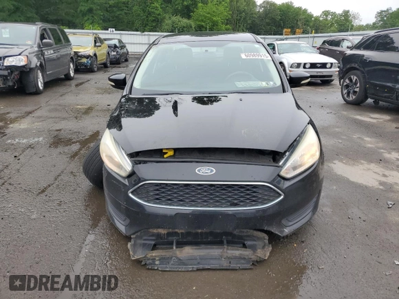 2016 Ford Focus SE z VIN 1FADP3F26GL340954, wystawiony jako Copart lot #60989915 z przebiegiem 26 052 mil mil oraz Szkoda całkowita • Salvage title. Historia ofert i sprzedaży dostępna na DreamBid. Obrazek 5.