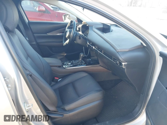 2024 Mazda CX-30 S Premium with VIN 3MVDMBDM9RM628162, listed as a IAAI auction lot 41262359 with 30,392 mi miles and . Bid and sale history available at DreamBid. Image 5.