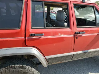 1996 Jeep Cherokee Country with VIN 1J4FJ78S9TL130605, listed as a Copart auction lot 74673934 with 196,857 mi miles and Salvage Title. Bid and sale history available at carsss.com. Image 11.