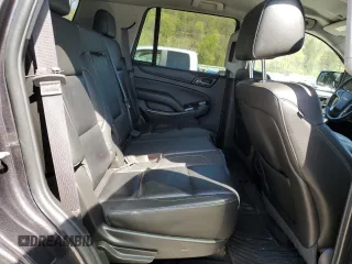 2015 Chevrolet Tahoe LT z VIN 1GNSKBKC6FR156951, wystawiony jako Copart lot #54666335 z przebiegiem 156 139 mil mil oraz Szkoda całkowita • Salvage title. Historia ofert i sprzedaży dostępna na DreamBid. Obrazek 11.