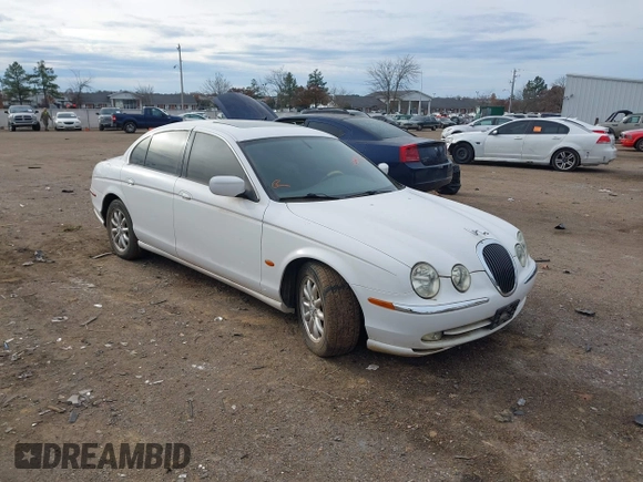 2002 Jaguar S-Type with VIN SAJDA01P12GM35163, listed as a IAAI auction lot 41097415 with 114,017 mi miles and . Bid and sale history available at DreamBid. Image 1.