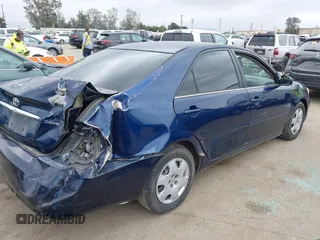 2005 Toyota Camry STD z VIN 4T1BE32K55U084967, wystawiony jako IAAI lot #42138311 z przebiegiem 272 779 mil mil oraz . Historia ofert i sprzedaży dostępna na DreamBid. Obrazek 4.