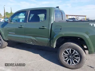 2021 Toyota Tacoma SR z VIN 3TMCZ5AN7MM395940, wystawiony jako IAAI lot #41860127 z przebiegiem 39 338 mil mil oraz . Historia ofert i sprzedaży dostępna na DreamBid. Obrazek 14.
