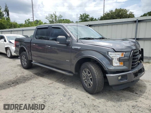 2015 Ford F-150 XLT with VIN 1FTEW1EG8FFC03207, listed as a Copart auction lot 59690515 with 261,153 mi miles and Salvage title. Bid and sale history available at DreamBid. Image 4.