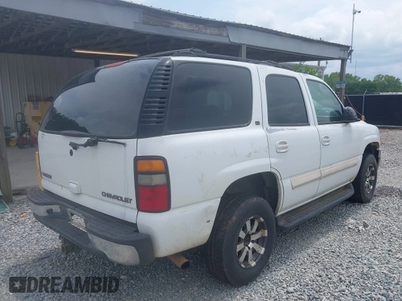 2004 Chevrolet Tahoe LT with VIN 1GNEC13ZX4J232416, listed as a IAAI auction lot 42125559 with 407,838 mi miles and . Bid and sale history available at DreamBid. Image 4.