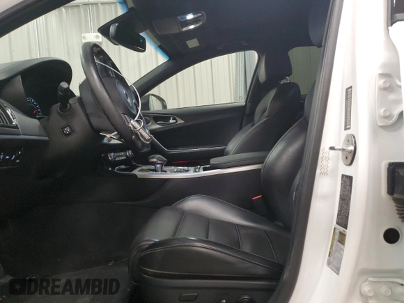 2018 Kia Stinger GT2 with VIN KNAE55LC6J6040346, listed as a Copart auction lot 82428994 with 62,560 mi miles and Salvage Title. Bid and sale history available at DreamBid. Image 7.