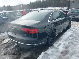 2015 Audi A8 L 4.0T with VIN WAU32AFD2FN033629, listed as a IAAI auction lot 41448956 with 120,364 mi miles. Bid and sale history available at carsss.com. Image 4.