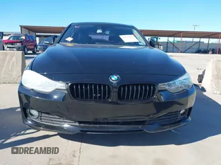 2015 BMW 3 Series 320i with VIN WBA3B1G52FNT63889, listed as a IAAI auction lot 41717925 with 73,736 mi miles. Bid and sale history available at carsss.com. Image 13.