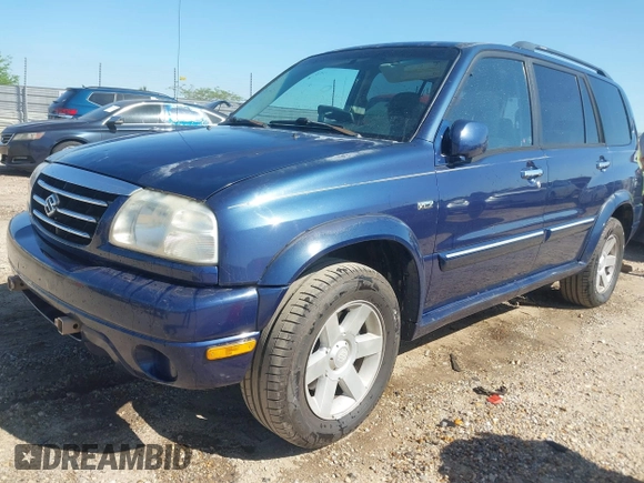 2003 Suzuki XL7 Touring z VIN JS3TX92V234104722, wystawiony jako IAAI lot #41994253 z przebiegiem 185 553 mil mil oraz . Historia ofert i sprzedaży dostępna na DreamBid. Obrazek 2.