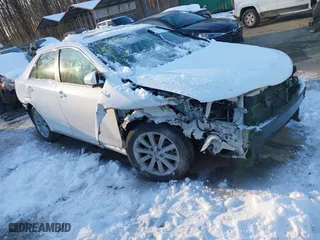 2014 Toyota Camry Hybrid LE with VIN 4T1BD1FK7EU114181, listed as a IAAI auction lot 41294936 with 115,986 mi miles. Bid and sale history available at carsss.com. Image 1.