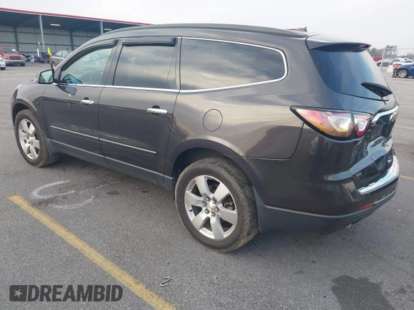2015 Chevrolet Traverse LTZ with VIN 1GNKVJKDXFJ206159, listed as a IAAI auction lot 41762515 with 143,062 mi miles and . Bid and sale history available at DreamBid. Image 3.