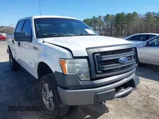 2013 Ford F-150 XL with VIN 1FTFW1ET7DKF33281, listed as a IAAI auction lot 41740736 with 205,677 mi miles. Bid and sale history available at carsss.com. Image 1.