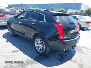 2013 Cadillac SRX Luxury Collection z VIN 3GYFNCE34DS542193, wystawiony jako IAAI lot #42387105 z przebiegiem 168 901 mil mil oraz . Historia ofert i sprzedaży dostępna na DreamBid. Obrazek 3.