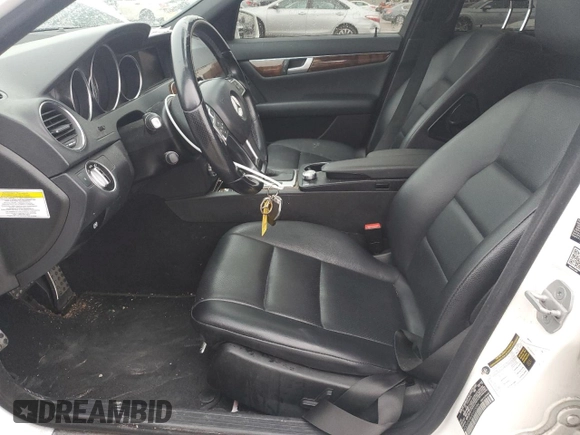 2014 Mercedes-Benz C with VIN WDDGF4HB2EA935084, listed as a Copart auction lot 44710705 with 129,016 mi miles and Salvage Title. Bid and sale history available at carsss.com. Image 7.