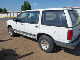 1992 Ford Explorer Eddie Bauer z VIN 1FMDU34X7NUA59055, wystawiony jako IAAI lot #42472171 z przebiegiem 98 269 mil mil oraz . Historia ofert i sprzedaży dostępna na DreamBid. Obrazek 3.