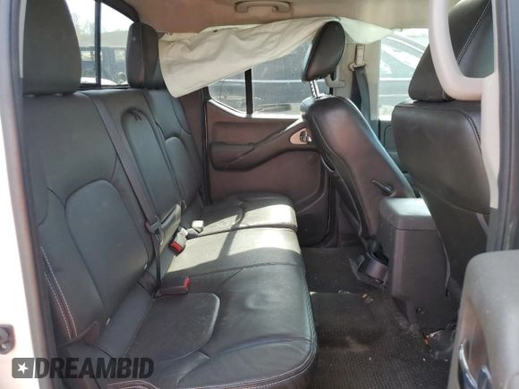 2015 Nissan Frontier Pro-4X with VIN 1N6AD0EV5FN700571, listed as a Copart auction lot 50974615 with 138,930 mi miles and Salvage title. Bid and sale history available at DreamBid. Image 10.