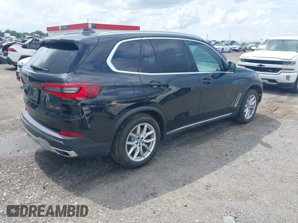 2020 BMW X5 xDrive40i with VIN 5UXCR6C04L9D63551, listed as a IAAI auction lot 42505561 with 56,763 mi miles and . Bid and sale history available at DreamBid. Image 4.