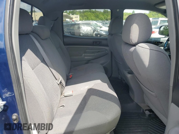 2005 Toyota Tacoma z VIN 5TEMU52N55Z126664, wystawiony jako Copart lot #58775425 z przebiegiem 233 069 mil mil oraz Szkoda całkowita • Salvage title. Historia ofert i sprzedaży dostępna na DreamBid. Obrazek 10.