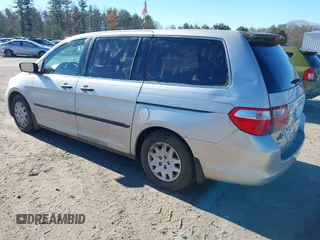2005 Honda Odyssey LX with VIN 5FNRL382X5B097268, listed as a IAAI auction lot 40809971 with 286,685 mi miles and . Bid and sale history available at DreamBid. Image 3.