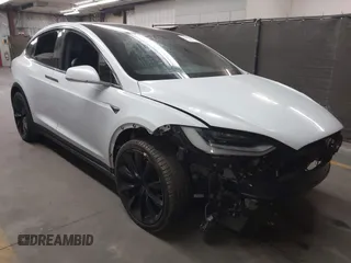 2020 Tesla Model X Long Range with VIN 5YJXCDE22LF305223, listed as a IAAI auction lot 41989862 with 48,309 mi miles. Bid and sale history available at carsss.com. Image 1.