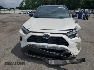 2022 Toyota RAV4 Hybrid XSE with VIN 2T3E6RFVXNW031612, listed as a Copart auction lot 60544055 with 99,831 mi miles and Salvage title. Bid and sale history available at DreamBid. Image 5.