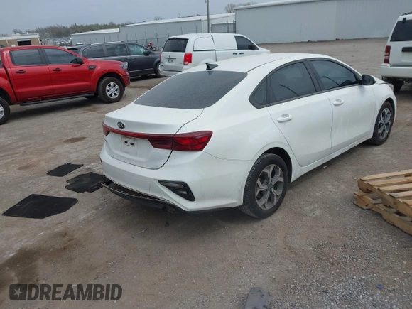 2021 Kia Forte LXS with VIN 3KPF24AD2ME369002, listed as a IAAI auction lot 41931053 with 58,865 mi miles and . Bid and sale history available at DreamBid. Image 4.
