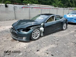 2014 Tesla Model S 60 z VIN 5YJSA1H11EFP43736, wystawiony jako Copart lot #63796365 z przebiegiem 154 702 mil mil oraz Szkoda całkowita • Salvage title. Historia ofert i sprzedaży dostępna na DreamBid. Obrazek 1.
