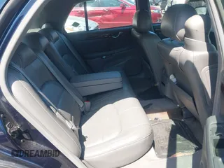 2002 Cadillac DeVille DTS with VIN 1G6KF57912U205527, listed as a IAAI auction lot 42064174 with 135,002 mi miles. Bid and sale history available at carsss.com. Image 8.