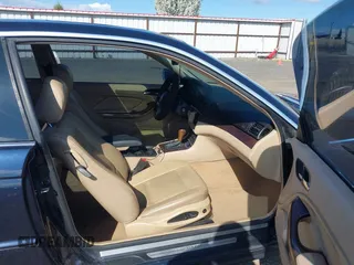 2006 BMW 3 Series 325Ci with VIN WBABD33446PL08864, listed as a IAAI auction lot 42078036 with 146,880 mi miles. Bid and sale history available at carsss.com. Image 5.