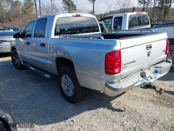 2006 Dodge Dakota SLT with VIN 1D7HE48N16S640961, listed as a IAAI auction lot 41485104 with 294,676 mi miles. Bid and sale history available at carsss.com. Image 3.