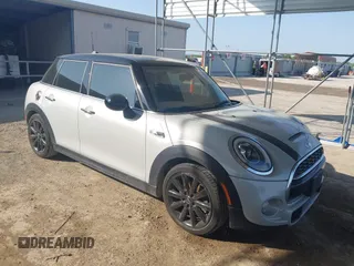 2015 MINI Hardtop 4 Door S z VIN WMWXU3C55F2B66314, wystawiony jako IAAI lot #42211312 z przebiegiem 101 395 mil mil oraz . Historia ofert i sprzedaży dostępna na DreamBid. Obrazek 1.