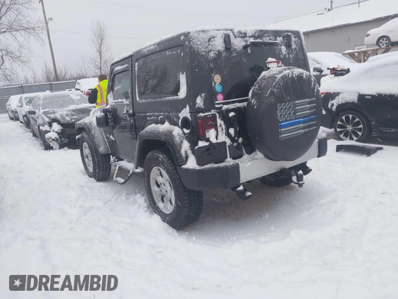 2014 Jeep Wrangler Sahara with VIN 1C4AJWBG3EL190302, listed as a IAAI auction lot 41299284 with 112,476 mi miles and . Bid and sale history available at DreamBid. Image 3.