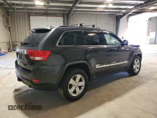 2011 Jeep Grand Cherokee Laredo with VIN 1J4RS4GG9BC517059, listed as a Copart auction lot 52704705 with 120,171 mi miles and Salvage Title. Bid and sale history available at DreamBid. Image 3.