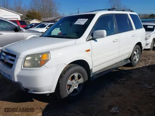 2006 Honda Pilot EX-L with VIN 5FNYF28526B006602, listed as a IAAI auction lot 41212862 with 239,648 mi miles. Bid and sale history available at carsss.com. Image 2.