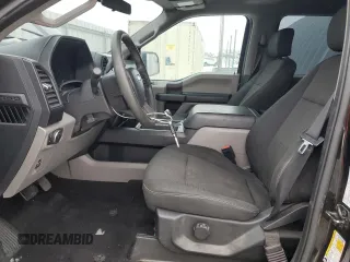 2019 Ford F-150 XL with VIN 1FTEW1E54KKE61689, listed as a Copart auction lot 87960225 with 94,355 mi miles and Salvage Title. Bid and sale history available at carsss.com. Image 7.