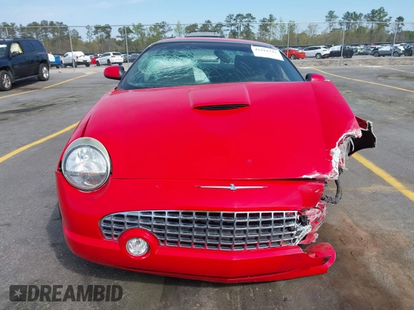 2002 Ford Thunderbird Hardtop Premium with VIN 1FAHP60A02Y130882, listed as a IAAI auction lot 41911737 with 18,521 mi miles and . Bid and sale history available at DreamBid. Image 13.