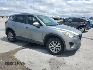 2014 Mazda CX-5 Sport with VIN JM3KE2BE1E0402185, listed as a Copart auction lot 52313675 with 140,398 mi miles and Salvage Title. Bid and sale history available at carsss.com. Image 4.