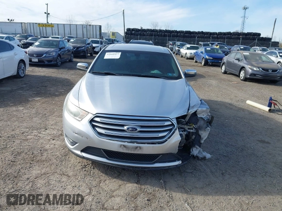 2014 Ford Taurus Limited with VIN 1FAHP2F86EG134779, listed as a IAAI auction lot 41660527 with 115,016 mi miles. Bid and sale history available at carsss.com. Image 12.