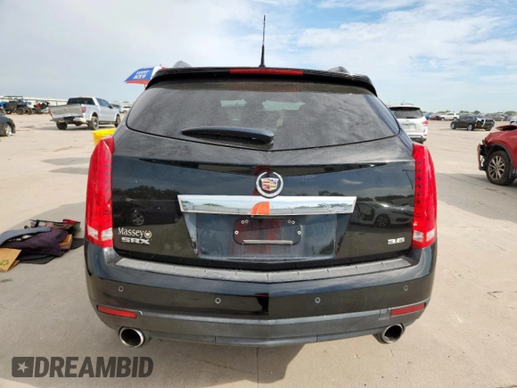 2012 Cadillac SRX Premium Collection with VIN 3GYFNCE3XCS596550, listed as a Copart auction lot 63011585 with 98,004 mi miles and Salvage title. Bid and sale history available at DreamBid. Image 6.