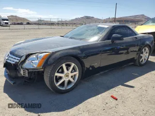 2004 Cadillac XLR z VIN 1G6YV34A345603061, wystawiony jako Copart lot #67412674 z przebiegiem 88 335 mil mil oraz Szkody całkowita. Historia ofert i sprzedaży dostępna na DreamBid. Obrazek 1.