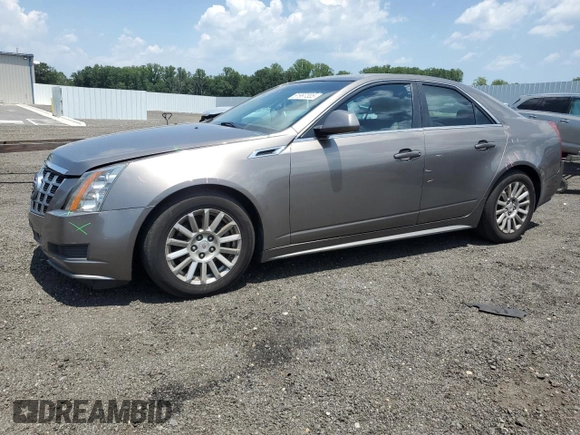 2012 Cadillac CTS Luxury with VIN 1G6DE5E54C0138040, listed as a Copart auction lot 61997305 with 140,996 mi miles and Salvage title. Bid and sale history available at DreamBid. Image 1.