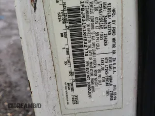 1994 Ford Econoline Wagon XL z VIN 1FBJS31H1RHB32773, wystawiony jako Copart lot #82008864 z przebiegiem Nie podano mil oraz Tytuł czysty. Historia ofert i sprzedaży dostępna na DreamBid. Obrazek 13.