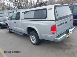 1999 Dodge Dakota SLT with VIN 1B7GG22YXXS255021, listed as a IAAI auction lot 41809325 with 204,352 mi miles and . Bid and sale history available at carsss.com. Image 3.