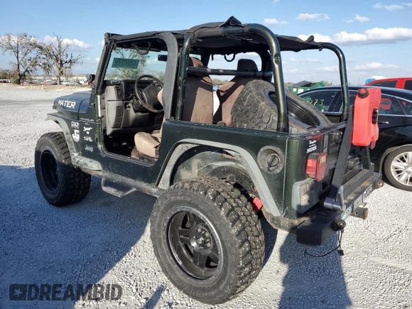 1997 Jeep Wrangler Sport with VIN 1J4FY19S0VP453959, listed as a Copart auction lot 44560295 with 182,464 mi miles and Salvage Title. Bid and sale history available at carsss.com. Image 2.